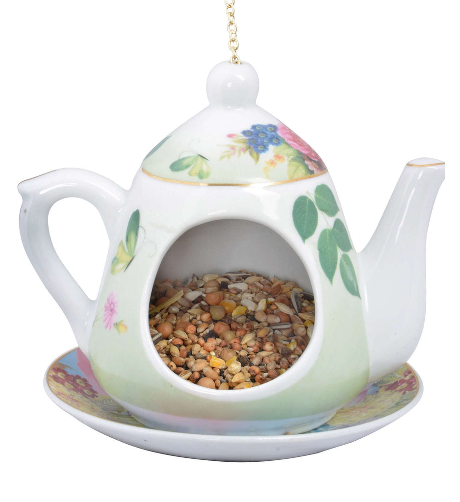 ceramic teapot bird feeder by Fallen Fruits