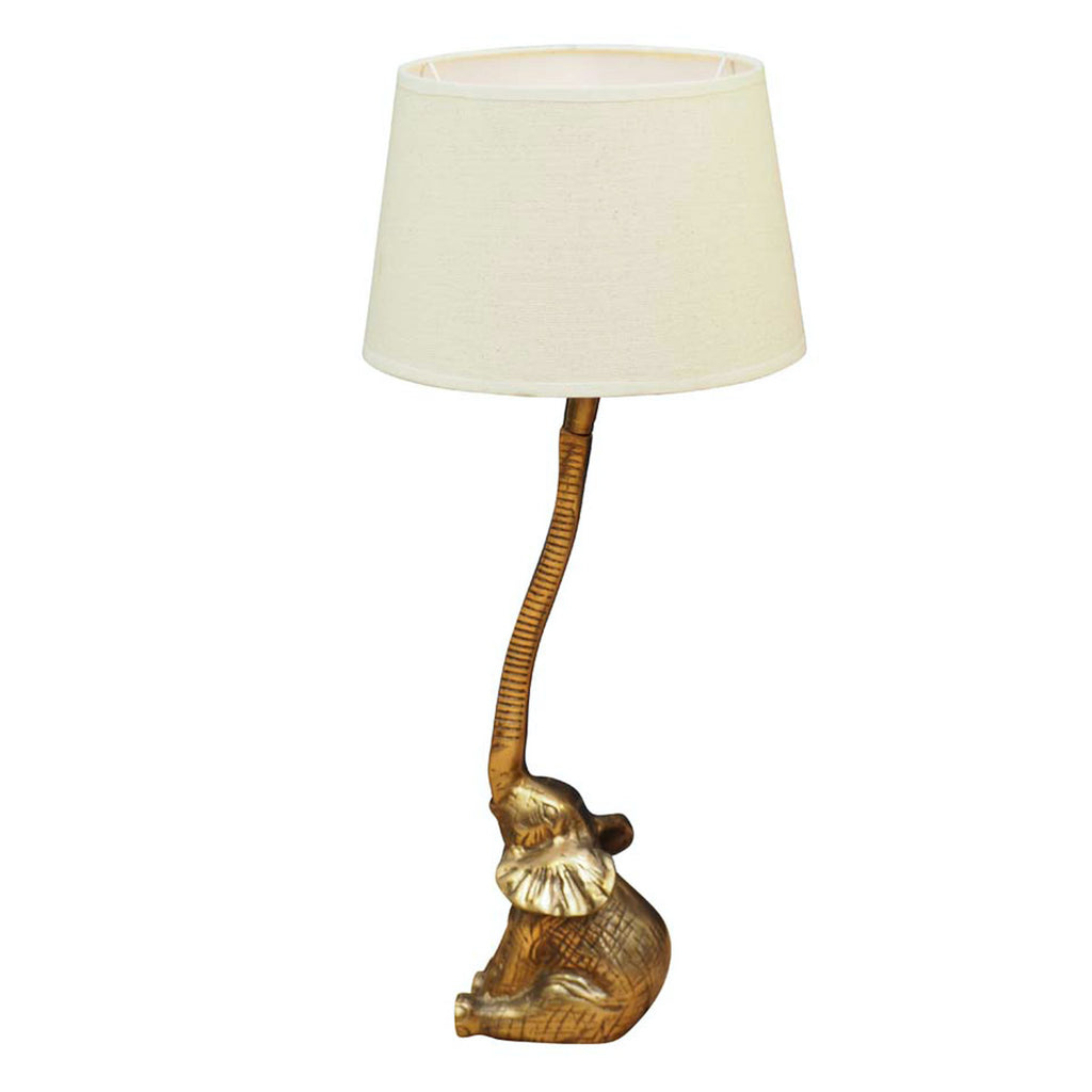 Brass elephant lamp with white linen shade 
