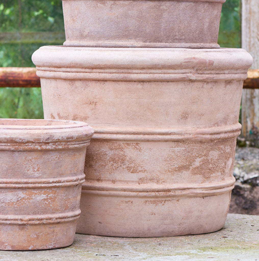 aged terracotta plant pots in three sizes