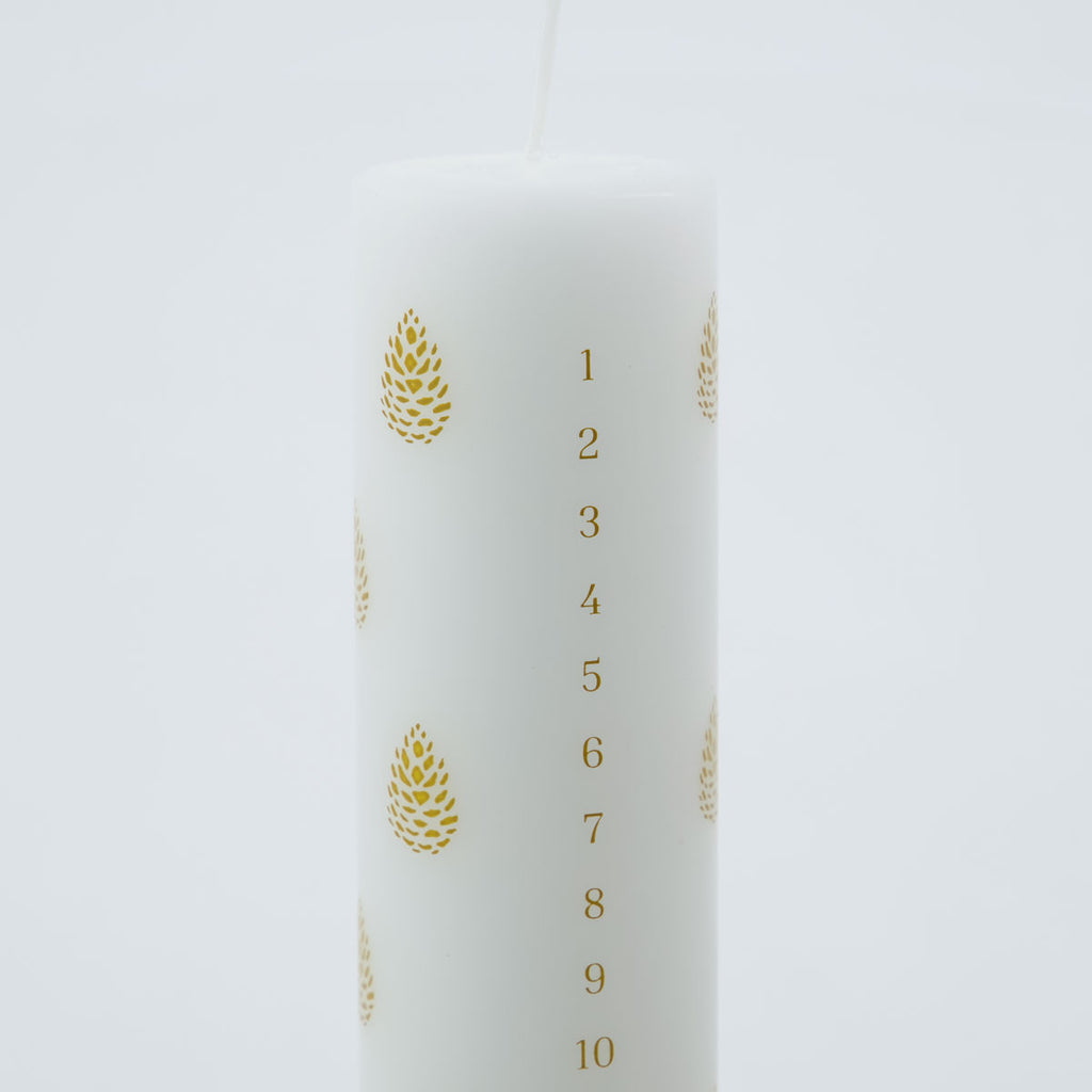 white and gold advent candle by House doctor