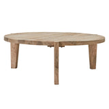 A round wooden coffee table with a natural light brown wood finish and four sturdy legs, shown against a plain white background.
