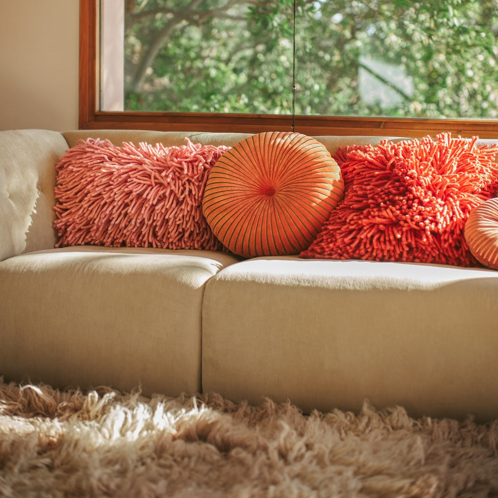 Fluffy pink cushion Rugged by HKliving is made from tactile fluffy wool 