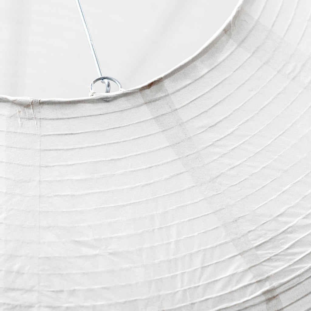 detail of white paper lampshade