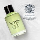Olverum bath oil bottle with brand logo on a light gray background