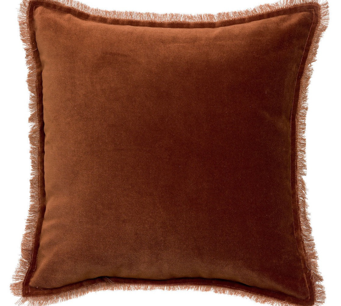 caramel brown velvet cushion with fringe edges