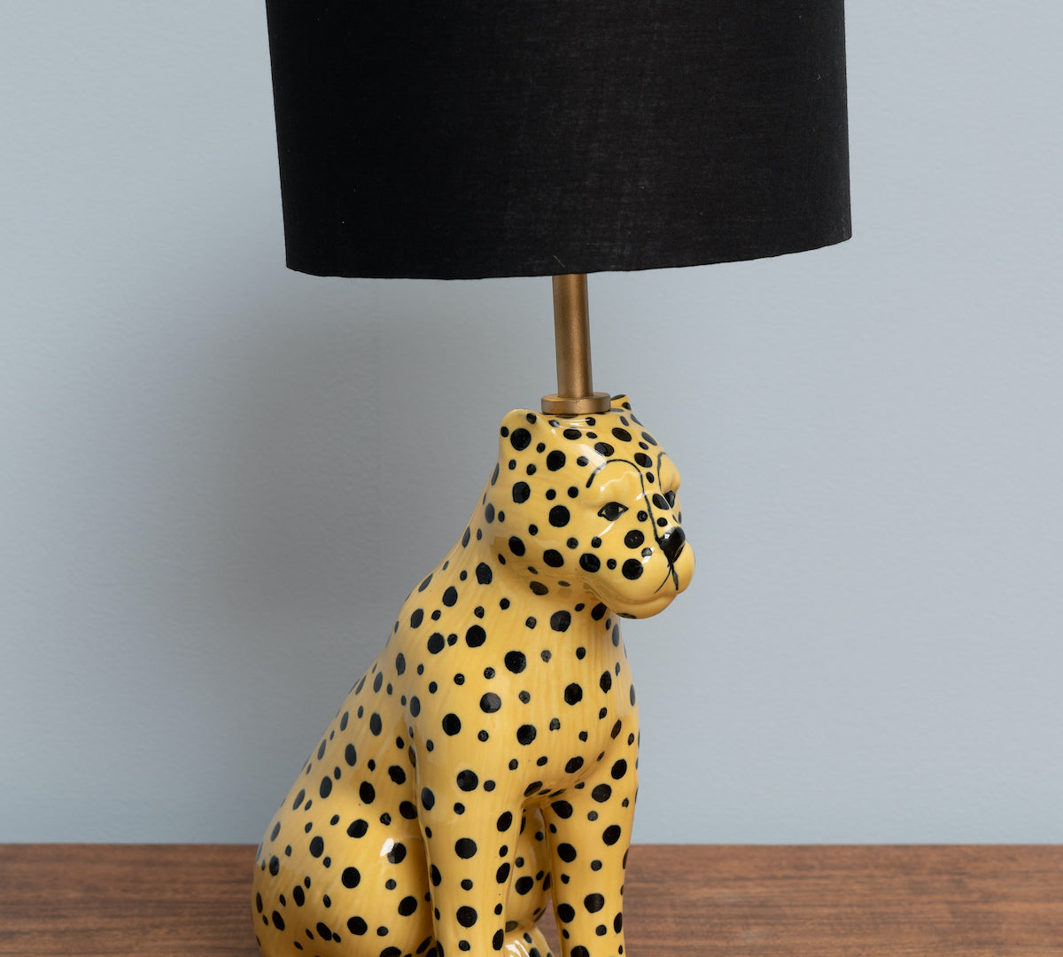 Yellow cheetah lamp with black shade