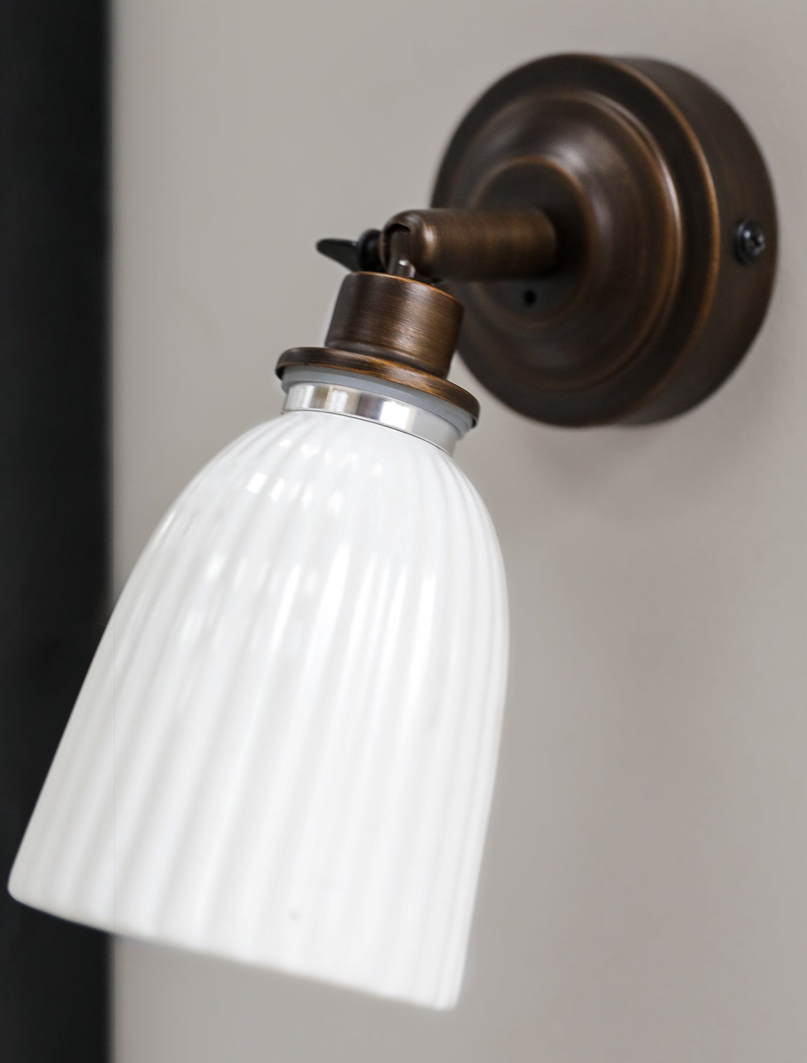 Alma bathroom wall light in bronze by Garden Trading