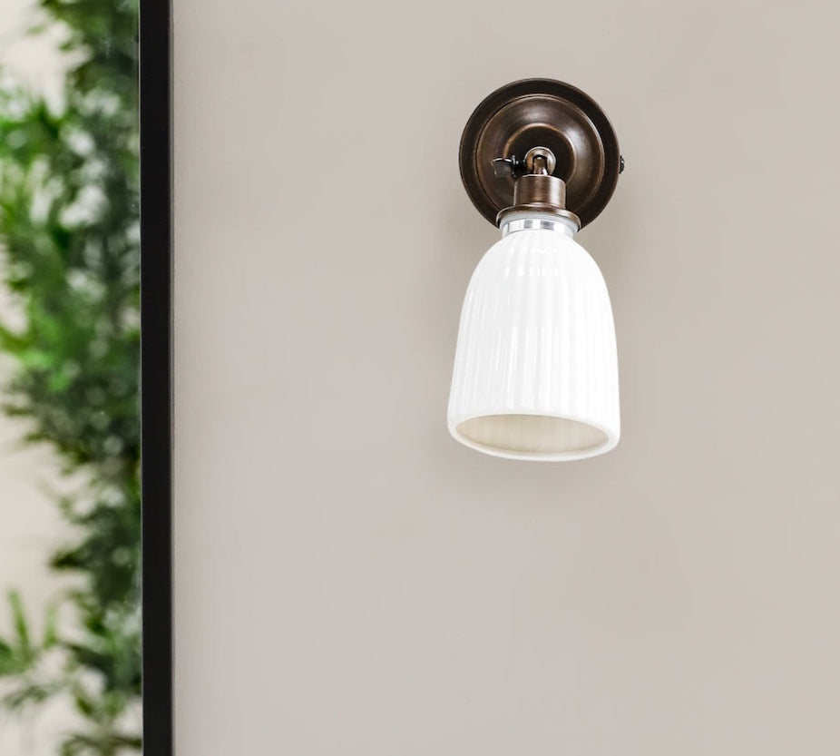 Alma bathroom wall light in bronze by Garden Trading
