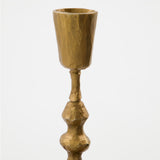 Gold candle holder on a white background