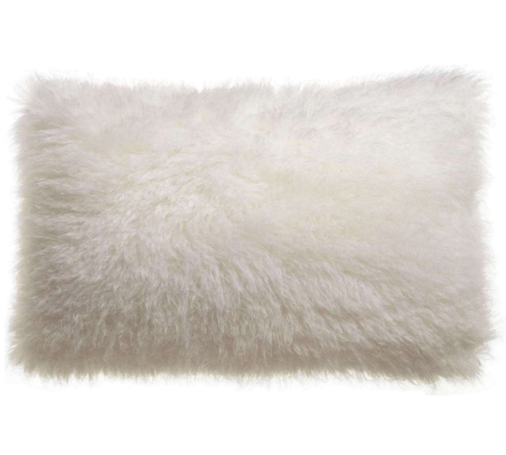 A rectangular fluffy faux fur cushion in off-white, shown against a plain white background.