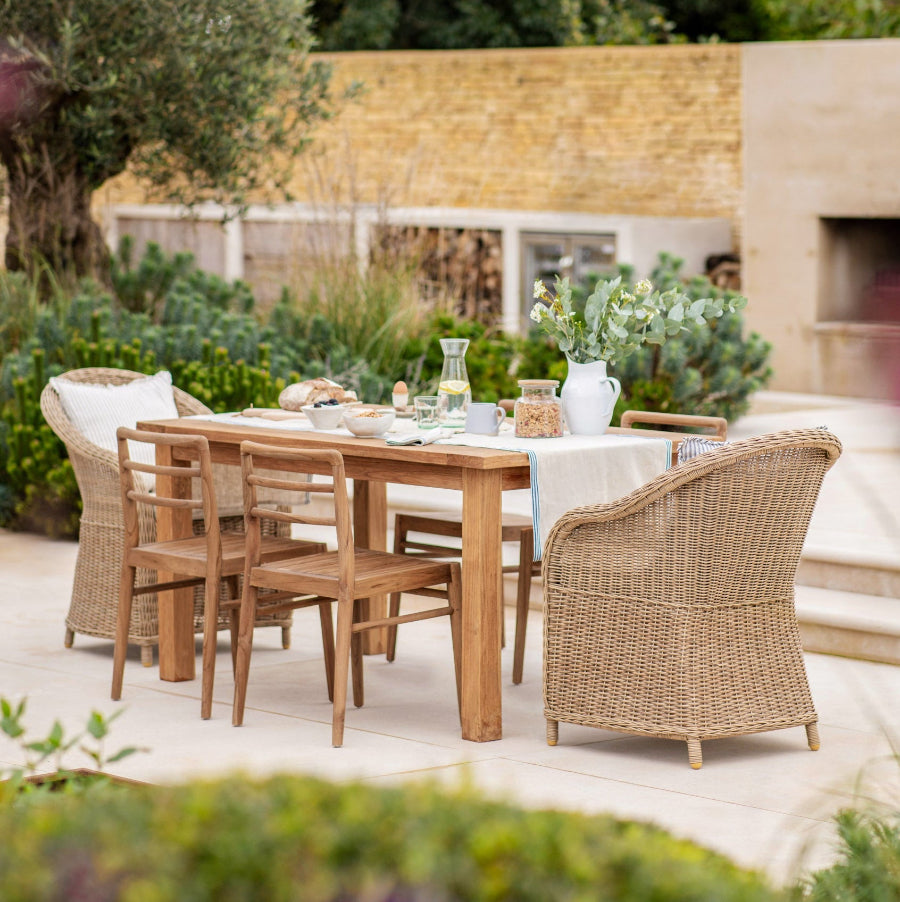 outdoor rattan amchairs and dining table 