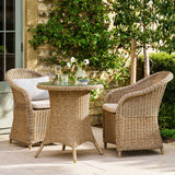rattan armchairs and coffee table