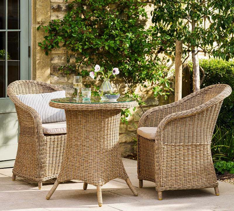 rattan armchairs and coffee table