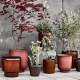 collection of brown plant pots by House Doctor 