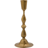 Gold candle holder on a white background