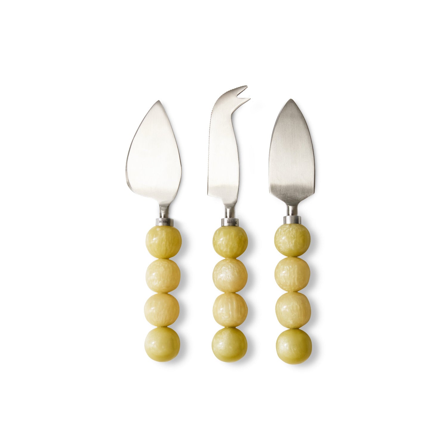 Three cheese knives with yellow bead handles on a white background