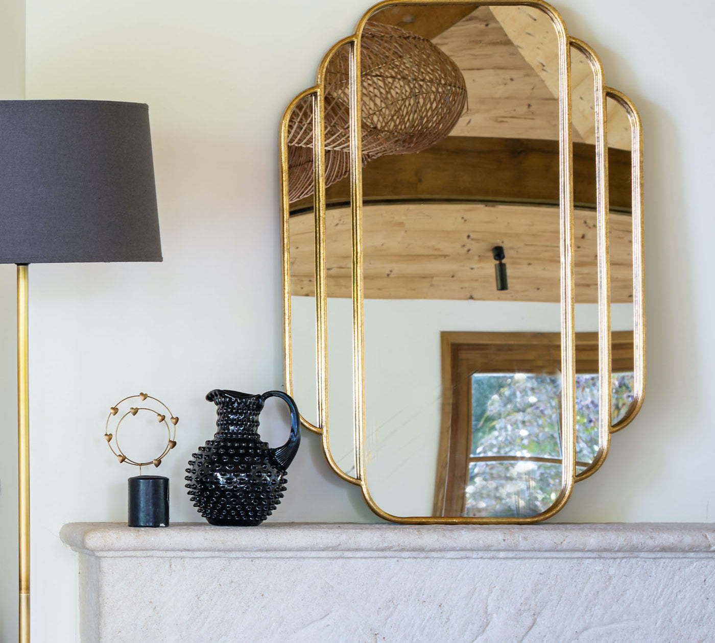 Gold framed deco wall mirror