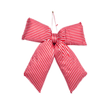 Red and white striped bow on a white background