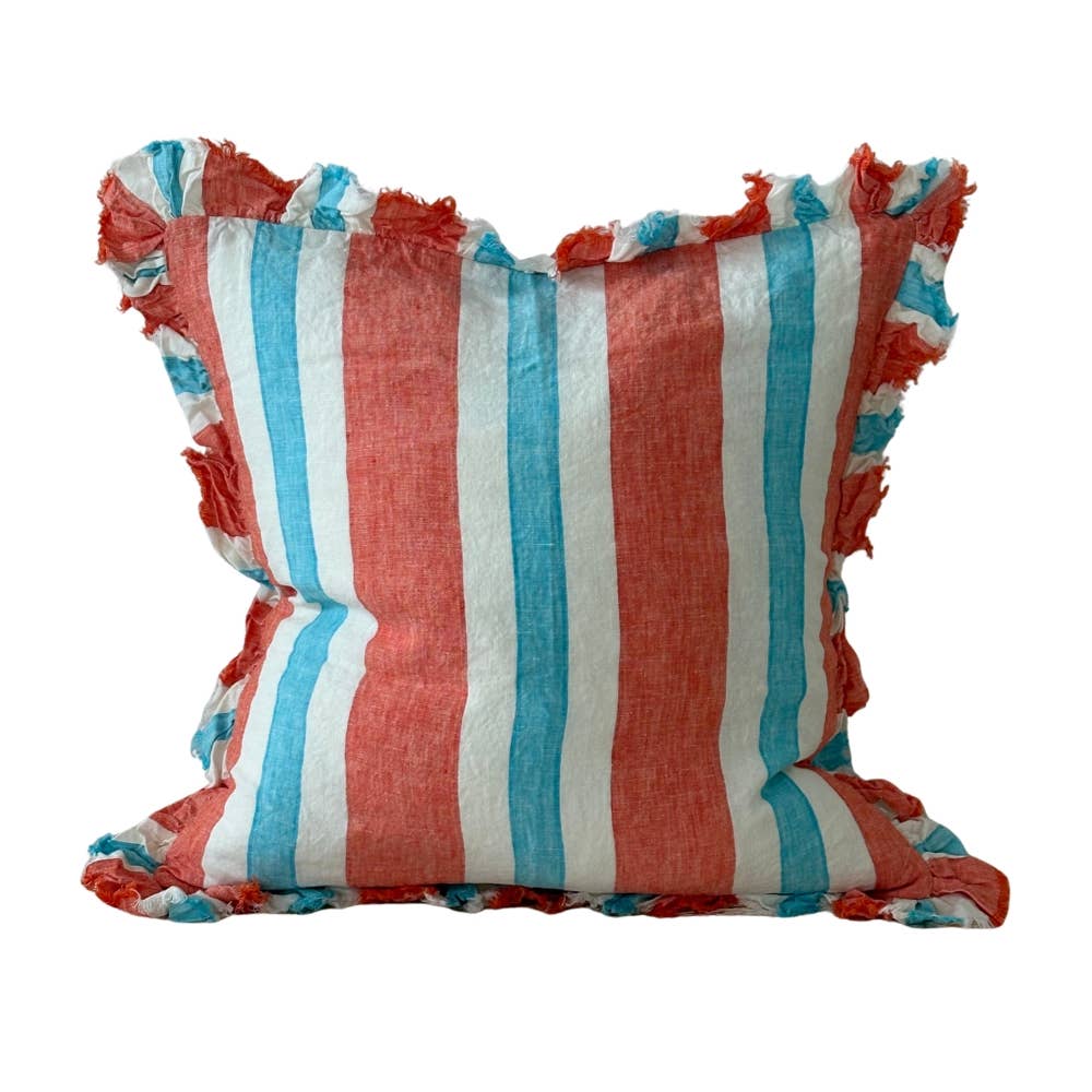 Coral stripe stonewashed linen cushion with fringe ruffle edge on white background, showing coral, aqua and white vertical stripe pattern