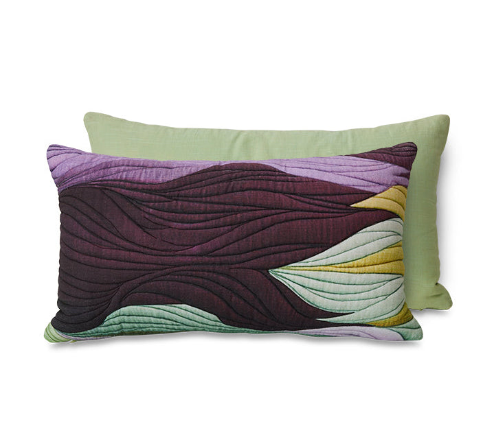 decorative pillow by HKLiving with wavy pattern on a white background
