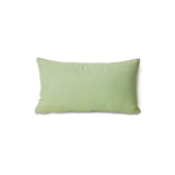 Green pillow on a white background