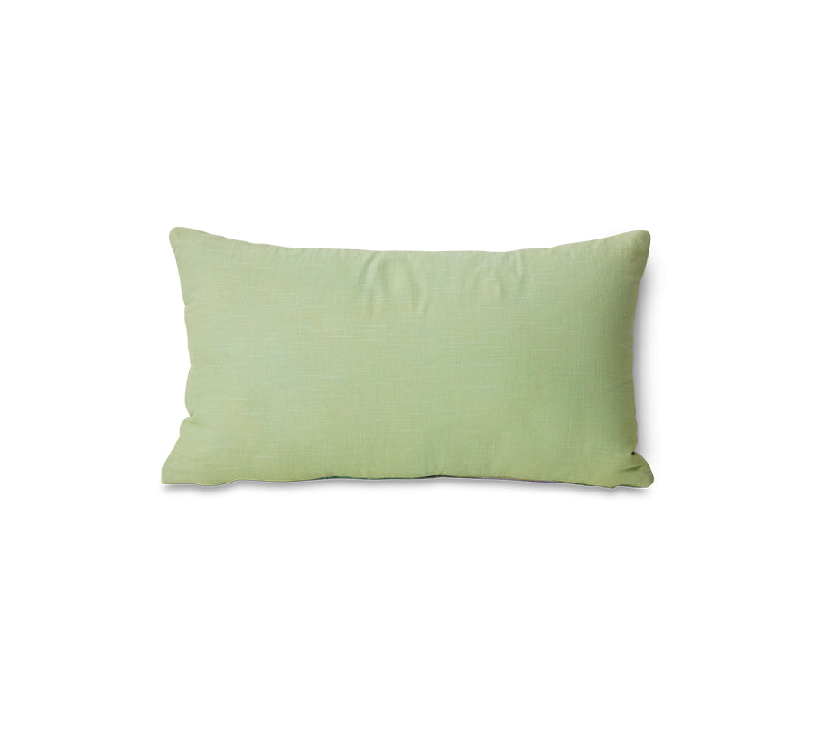 Green pillow on a white background