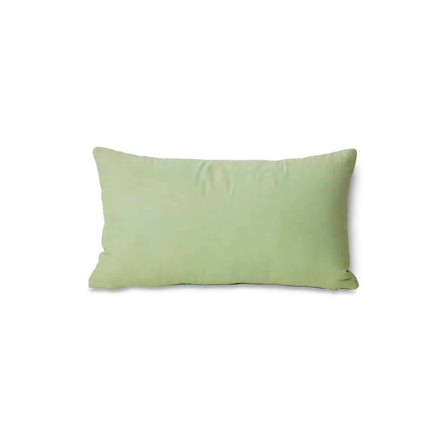 Green pillow on a white background