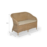 Rattan sofa with beige cushion and dimensions on a white background