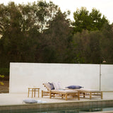 bamboo sun loungers with sand cushion