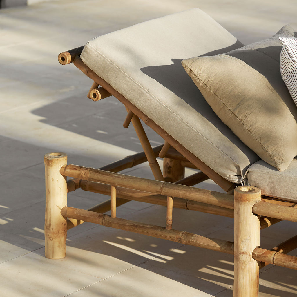 sand cushion on bamboo sun lounger