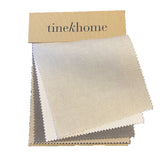Fabric swatches with 'tinekhome' branding on a white background