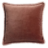 A square throw pillow in a  coffee brown velvet fabric with a fringed border, shown against a plain white background.