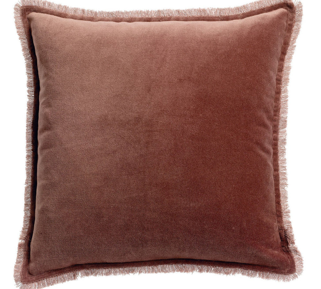 A square throw pillow in a  coffee brown velvet fabric with a fringed border, shown against a plain white background.