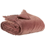 A dusty brown  throw blanket with frayed edges, shown rolled up on a solid white background.