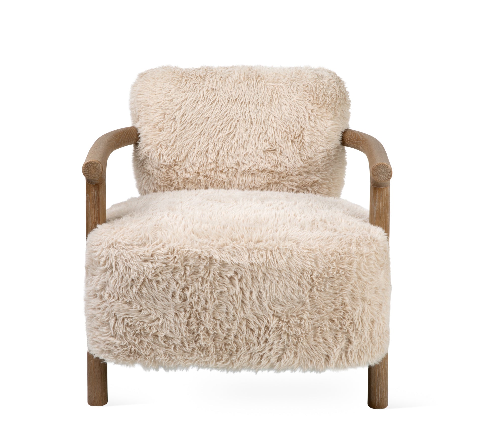 A modern accent chair featuring a thick, fluffy cream-colored sheepskin or faux fur upholstery with a natural wood frame and curved armrests, shown against a solid white background.