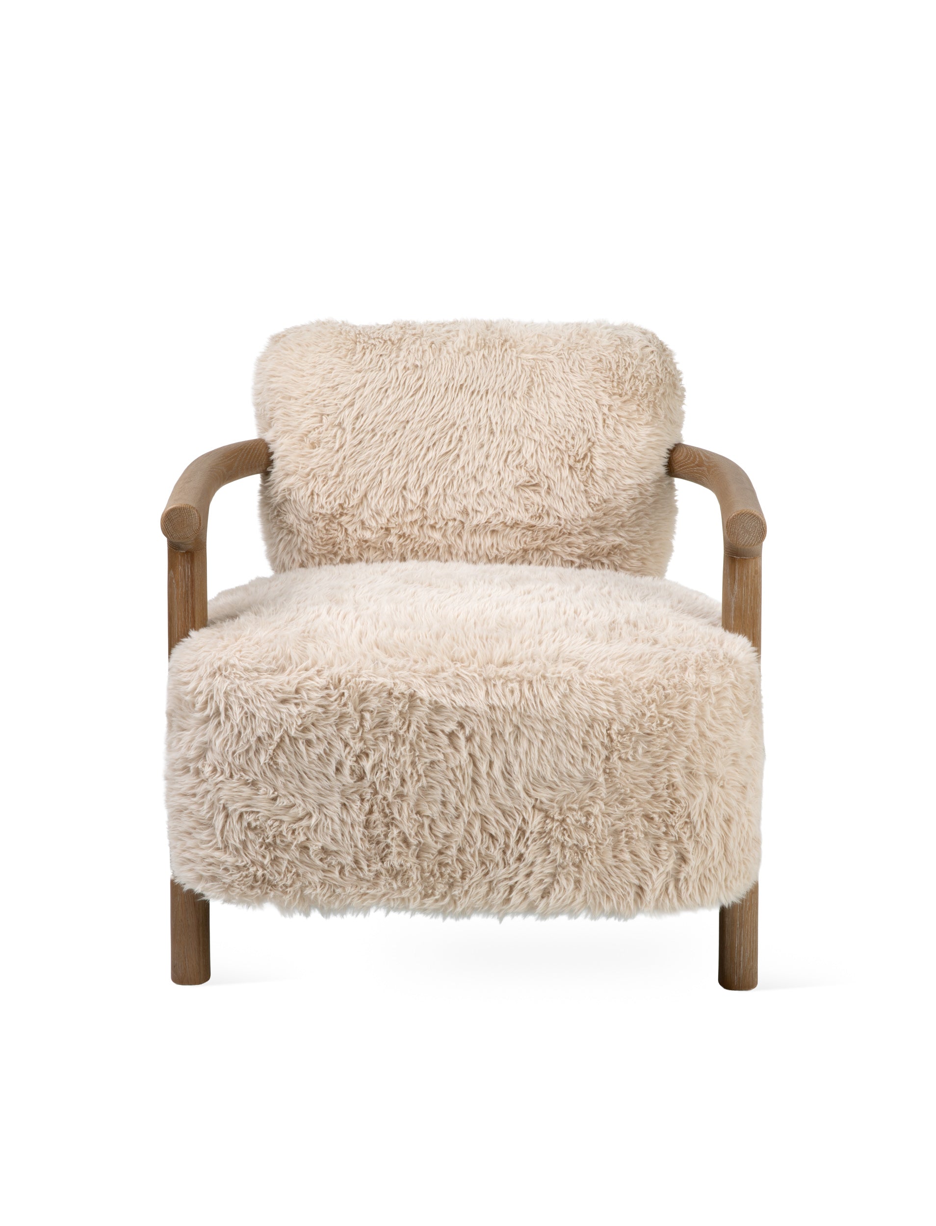A modern accent chair featuring a thick, fluffy cream-colored sheepskin or faux fur upholstery with a natural wood frame and curved armrests, shown against a solid white background.