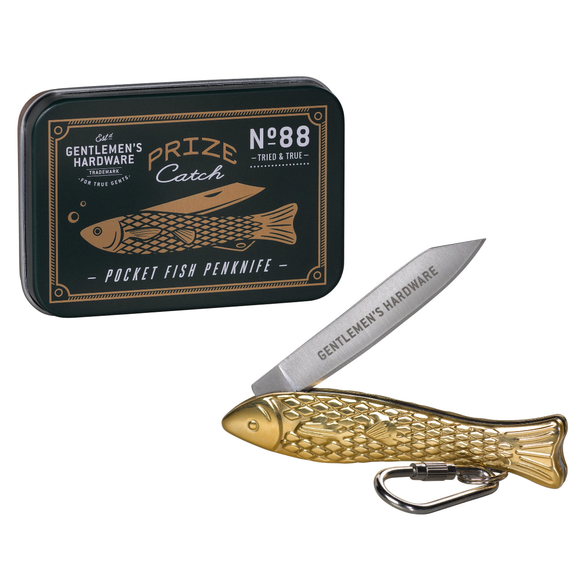 Gold fish-shaped penknife with black tin labeled 'Gentlemen's Hardware' on a white background