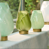 Set of decorative table lamps on a table with a blurred natural background