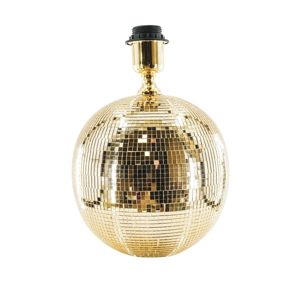 Gold disco ball lamp on a white background
