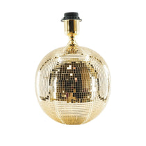 Gold disco ball lamp on a white background