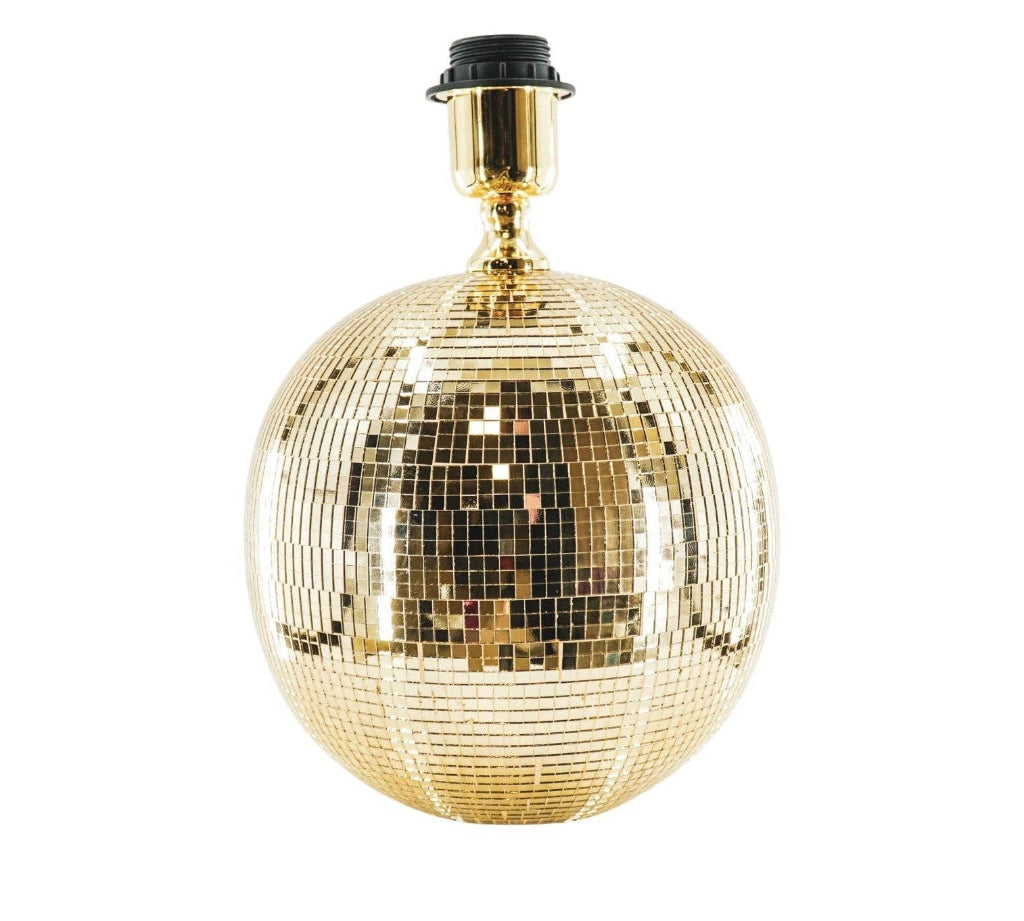 Gold disco ball lamp on a white background