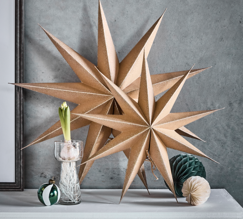 Large gold glitter paper stars 