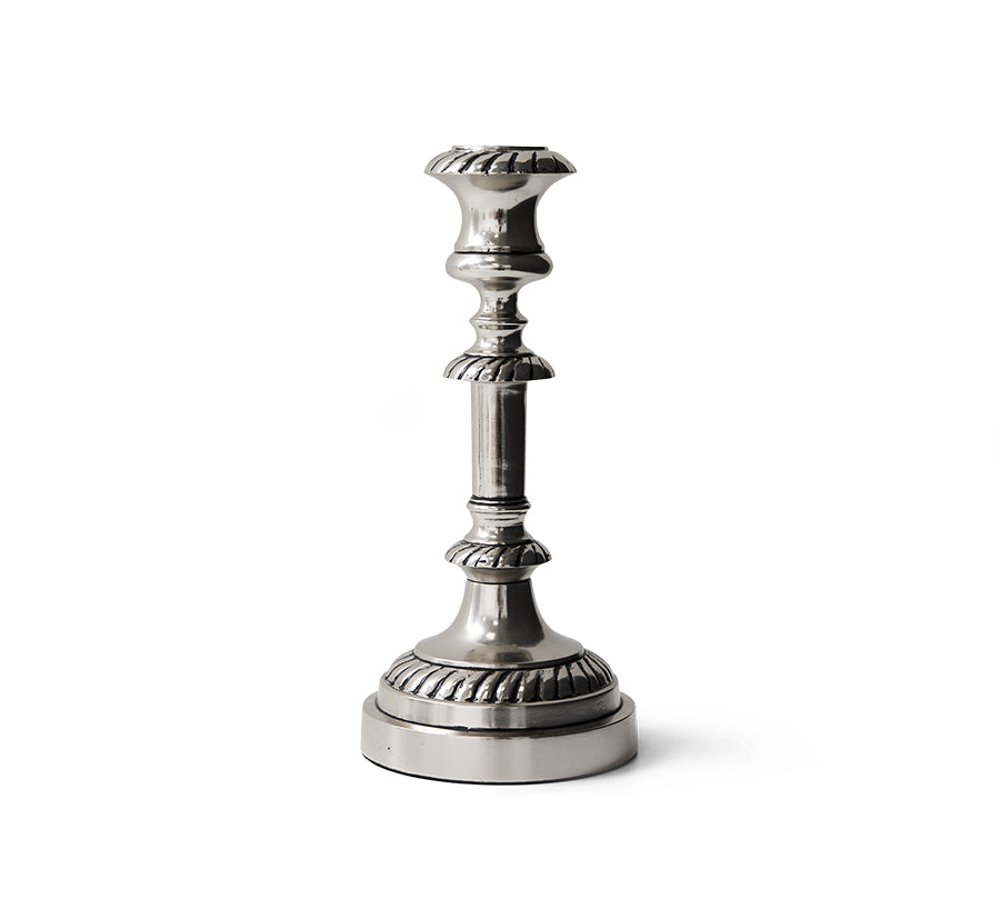 Silver candlestick holder on a white background