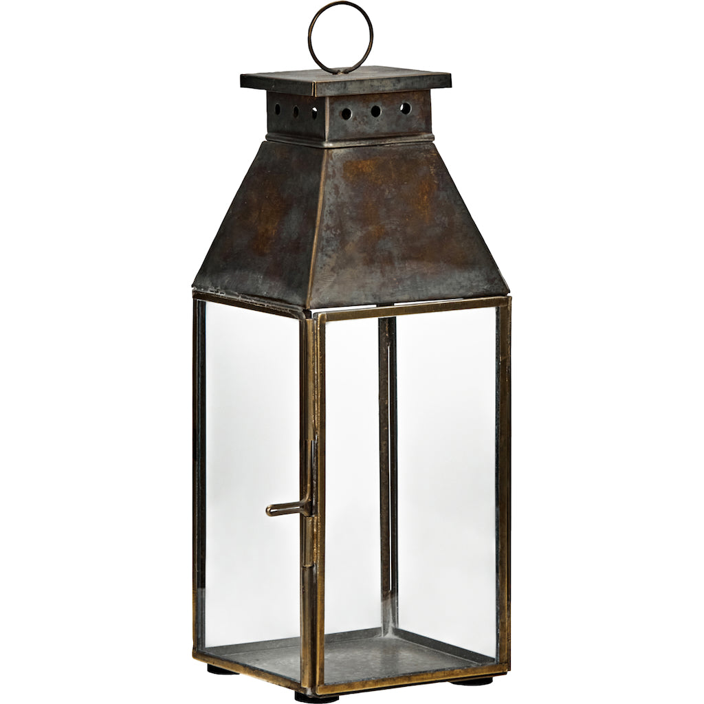 Decorative lantern with a metal top and glass body on a white background