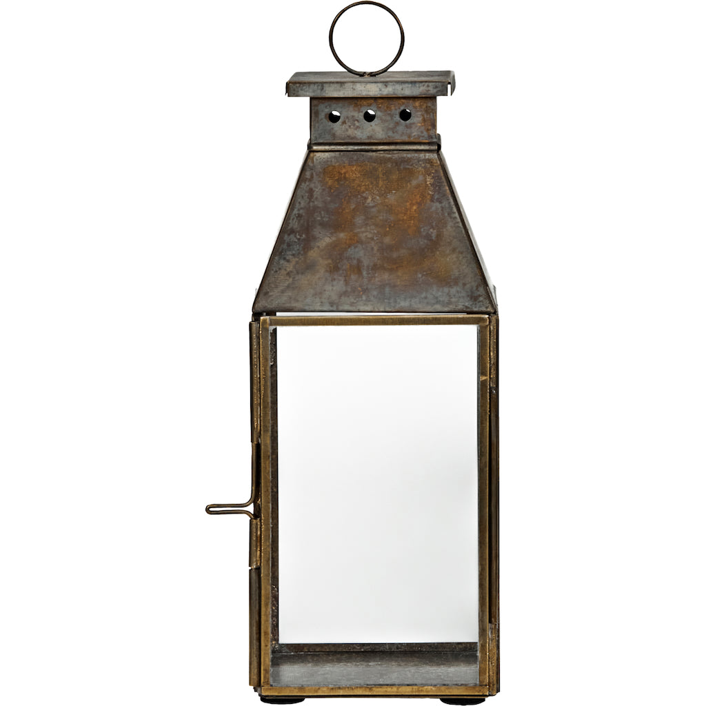 Rustic metal lantern with a white interior on a white background