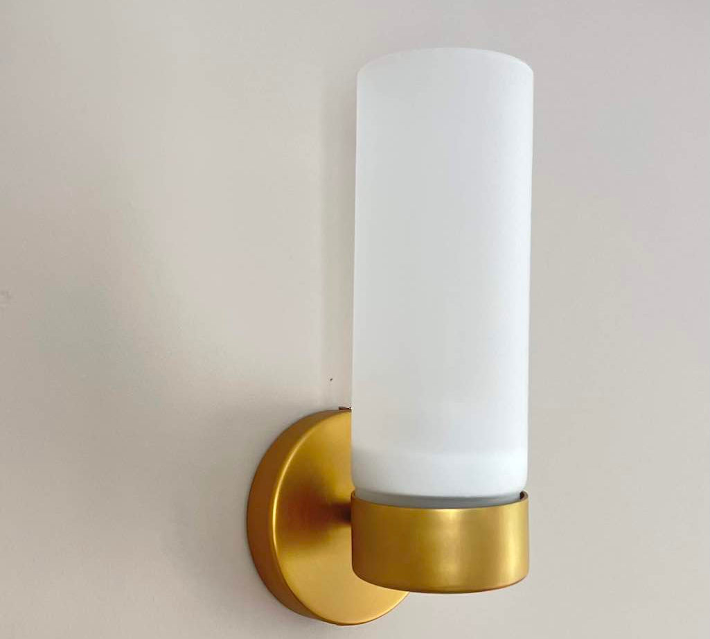 Brass and opaque white glass wall light 
