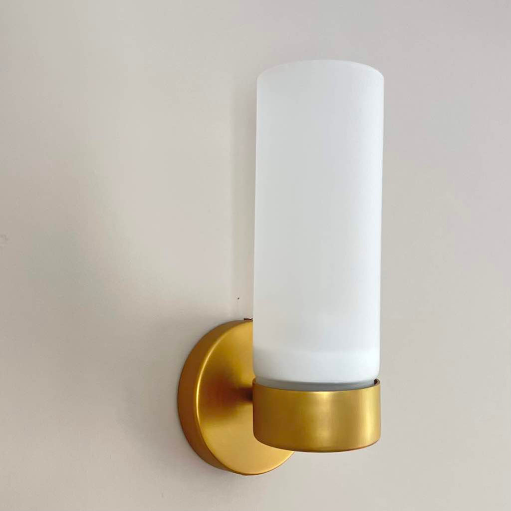 Brass and opaque white glass wall light 