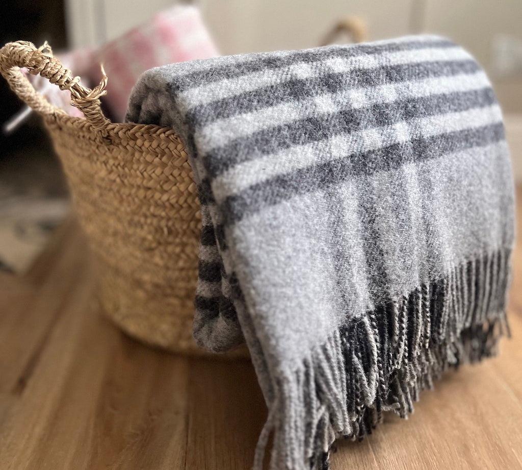 Grey hex check wool throw by Tweedmill
