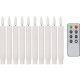 Set of 10 white candle-shaped lights with remote control on a white background