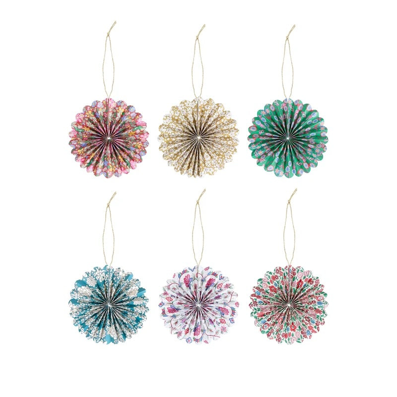 Six round hanging decorative ornaments made from pleated tissue paper, shown in assorted colors on a plain white background. The ornaments include pink, gold, green, blue, purple, and red patterns, each with a thin string loop at the top for hanging.